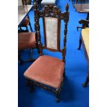 A set of eight 19th Century and later Carolean style oak dining chairs