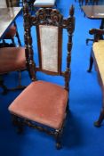 A set of eight 19th Century and later Carolean style oak dining chairs