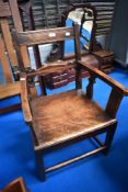 A Georgian mahogany solid seat carver chair of small proportions