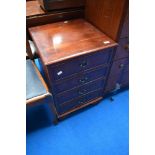 A reproduction regency style low chest of four bedside or similar drawers