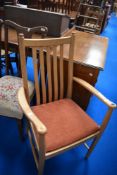 A modern Ercol carver chair