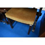A vintage mahogany dressing table stool