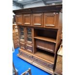 A vintage oak Continental style side cabinet of interesting design