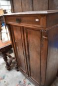 A 19th Century tall side cabinet