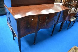 A reproduction regency style serpentine front sideboard