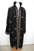 An extraordinary 1930s velvet coat, having painted glittery design throughout, Chartreuse coloured