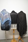 Three shawls, to include early 20th century paisley silk shawl and two late 19th/ early 20th century