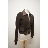 A 1960s/70s unisex suede jacket, having fitted waist and leather collar.