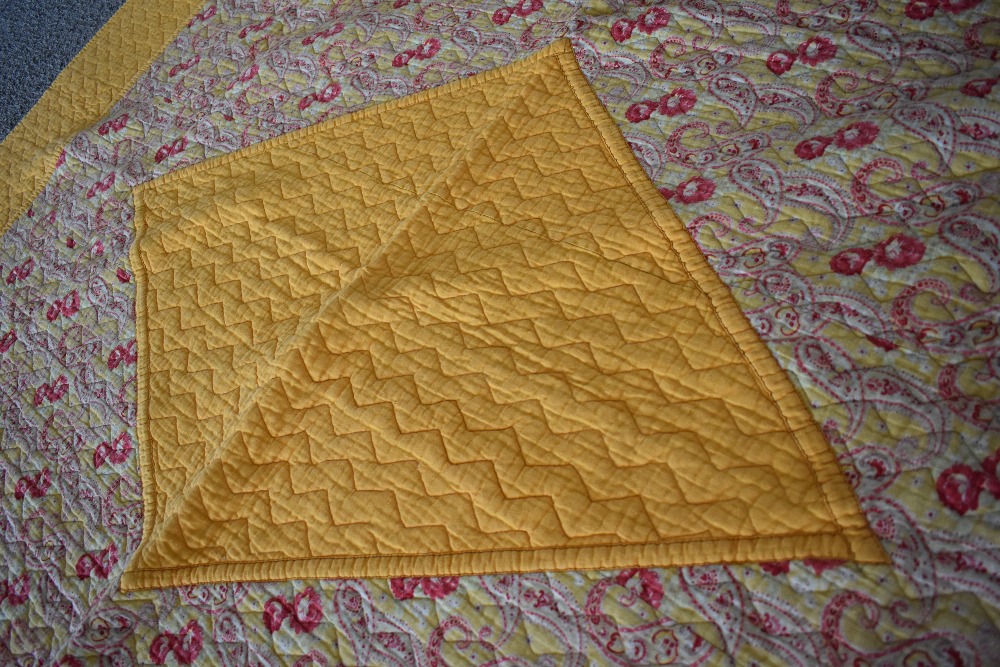 A 1930s/40s 'The Comfy' quilt, having paisley diamond to centre with block yellow surround and - Image 3 of 5