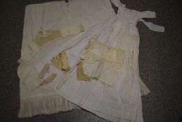 A Victorian babies gown, two pairs of gloves, a pair of sleeves, three unfinished bodices, one