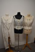 Two Victorian lawn cotton camisoles/ corset covers, having Embroidery to one and extensive cutwork