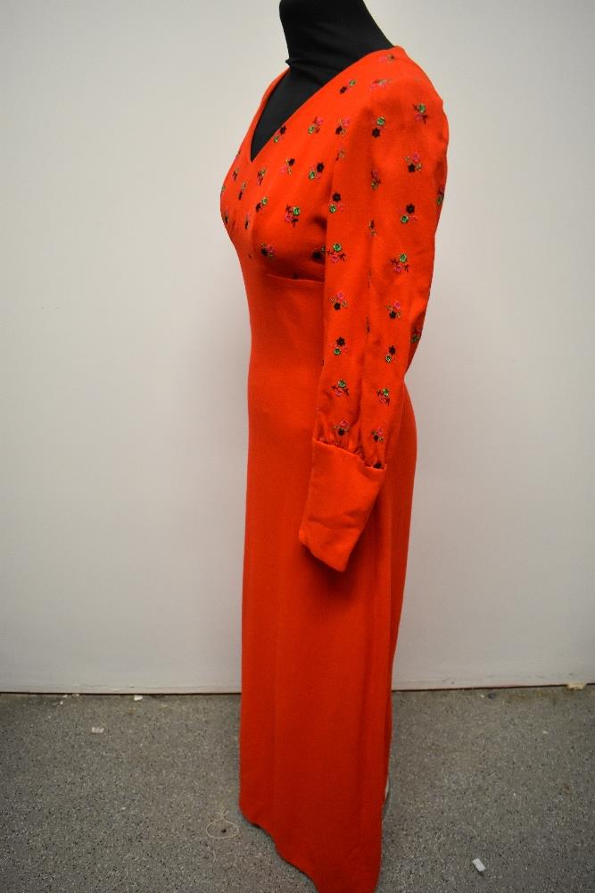A striking 1960s cherry red maxi dress of wool crepe type fabric, having embroidery to bust and - Image 4 of 8
