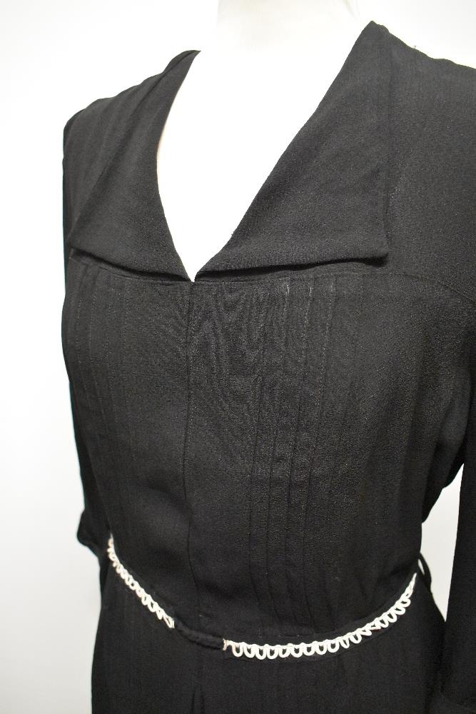 A 1940s crepe blouse having belted waist, 3/4 sleeves and button back fastening, larger size. - Image 2 of 7