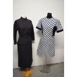 Two vintage dresses, to include; late 50s/early 60s wiggle dress with drop waist and buckle detail