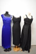 Three vintage evening gowns, including 1950s black watered taffeta with button detail to gathered