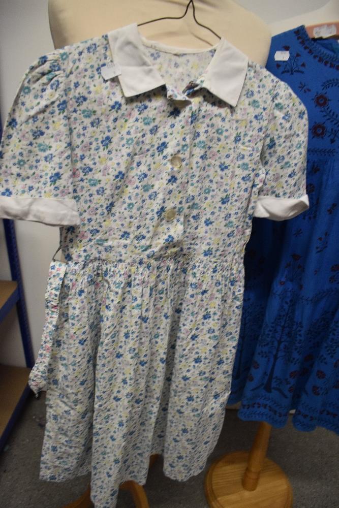 A mixed lot of childrens and babies clothing, including 1950s child's dress, 1970s blue dress and an - Image 7 of 7