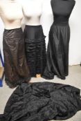 A selection of Victorian skirts and petticoats, AF and an unpicked garment which offers a good