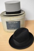 A vintage grey Christy's London top hat and a black 1940s/50s trilby.