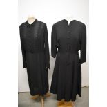 A 1940s crepe day dress, having buttons to front and cuffs, side metal zip and short zip to cuffs