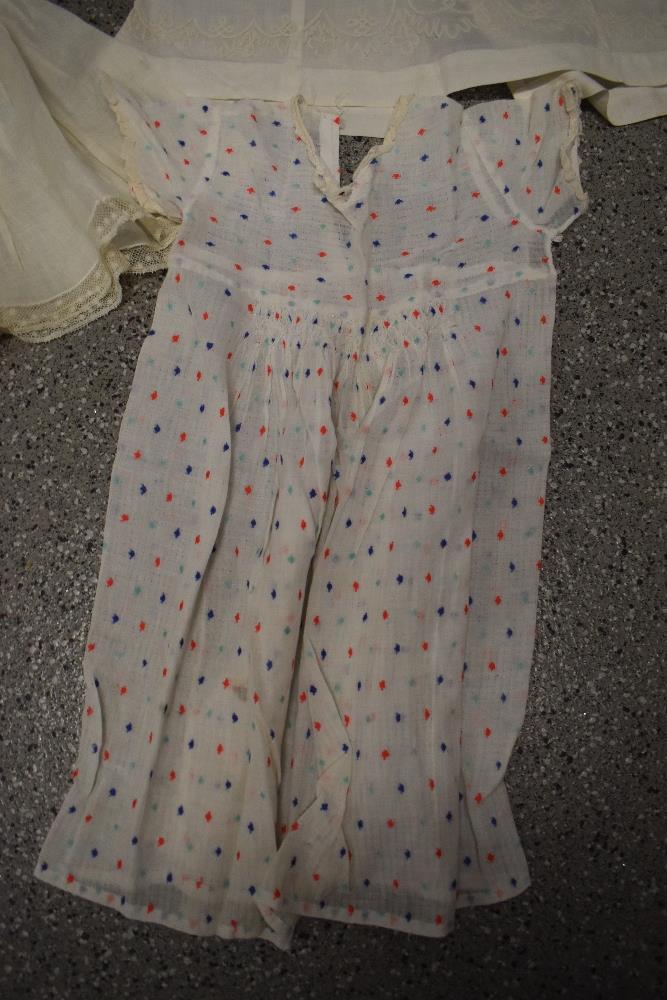 A mixed lot of childrens and babies clothing, including 1950s child's dress, 1970s blue dress and an - Image 5 of 7