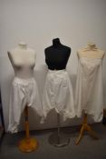 Two pairs of Victorian bloomers having lace to legs and a set of Victorian/ Edwardian cami knickers/