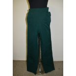 A pair of ladies 1940s/1950s bottle green high waisted Western slacks or trousers, with press