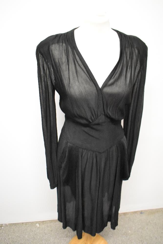 A late 1930s/early 40s semi sheer black day dress, having peplum detail to pointed dropped - Image 4 of 8