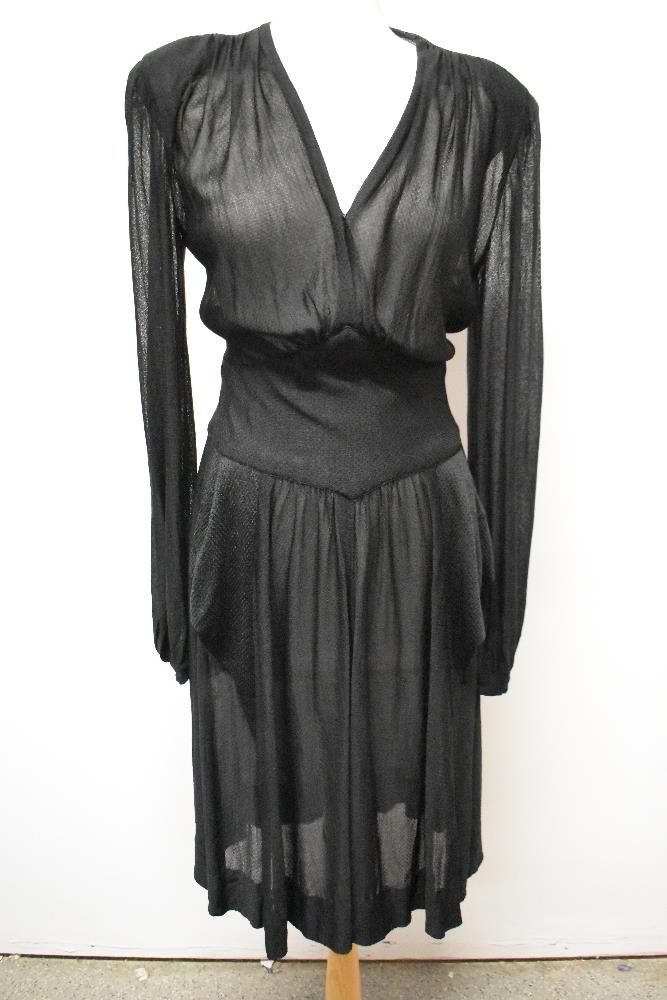 A late 1930s/early 40s semi sheer black day dress, having peplum detail to pointed dropped - Image 5 of 8