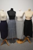 Three 1940s and 1950s skirts, including grey with colourful flecks and pleat to reverse with