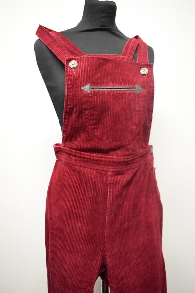 A pair of Circa mid century vibrant cherry red corduroy dungarees, having side button fastening, - Image 3 of 7
