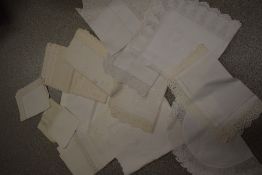 A selection of antique white work table linen, including drawn thread work, lace and crochet