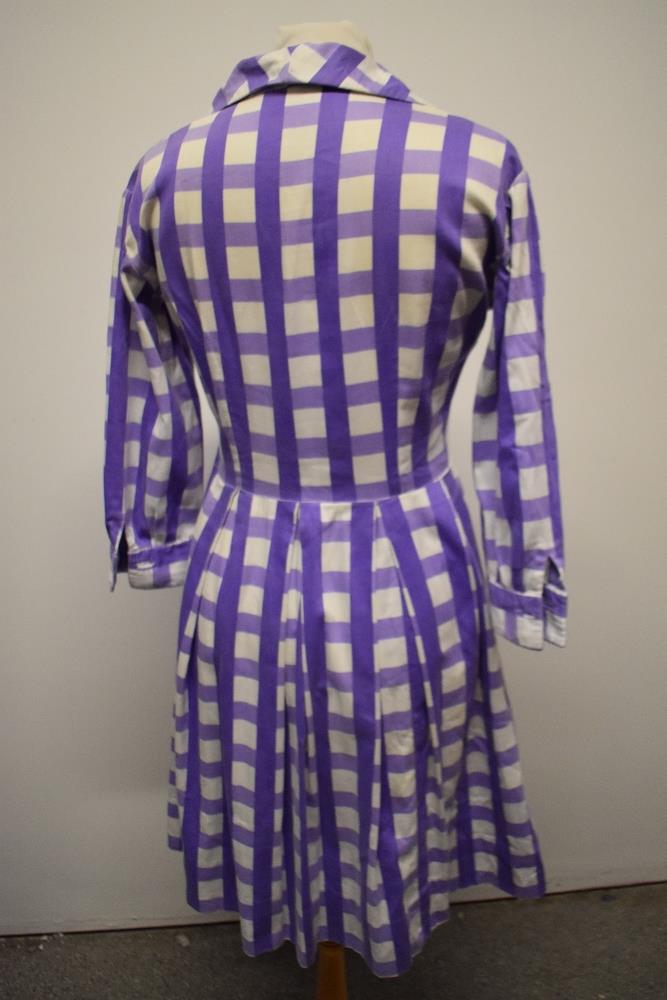 A late 1950s/ early 1960s cotton day dress having bold purple checked pattern, side metal zip, 3/4 - Image 4 of 5