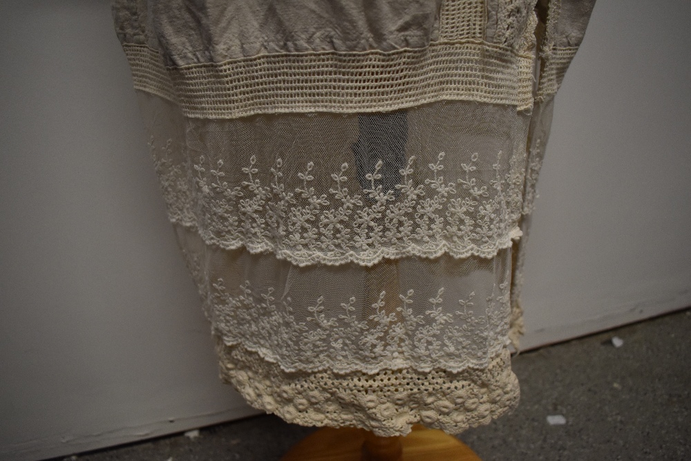 An interesting early 20th century linen smock/ over dress, having embroidered tulle panel to - Image 6 of 12