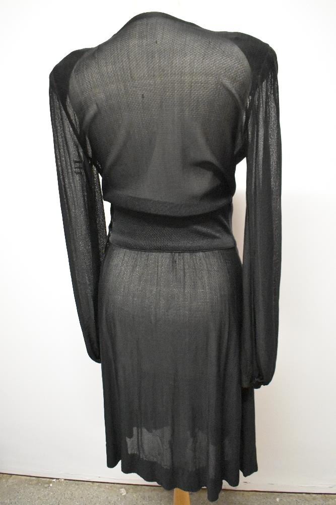 A late 1930s/early 40s semi sheer black day dress, having peplum detail to pointed dropped - Image 7 of 8