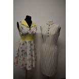 A 1960s floral mini dress and a late 1950s/ early 60s striped cotton shift dress with faux buttons
