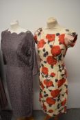 Three vintage dresses, comprising; late 1940s cotton dress with Peter Pan collar and button down