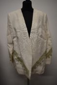 A retro cream linen and lacework jacket, fully lined, larger size.