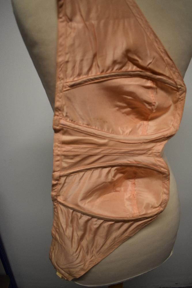 A 1940s strapless pink satin finish bra and a 1920s bralette with shirred back. - Image 10 of 10