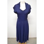 A stunning 1940s navy blue textured crepe day dress, having faux bolero bodice, appliqué detail to