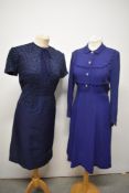 A 1940s patterned crepe dress in royal blue, having side press stud fastening and buttons to