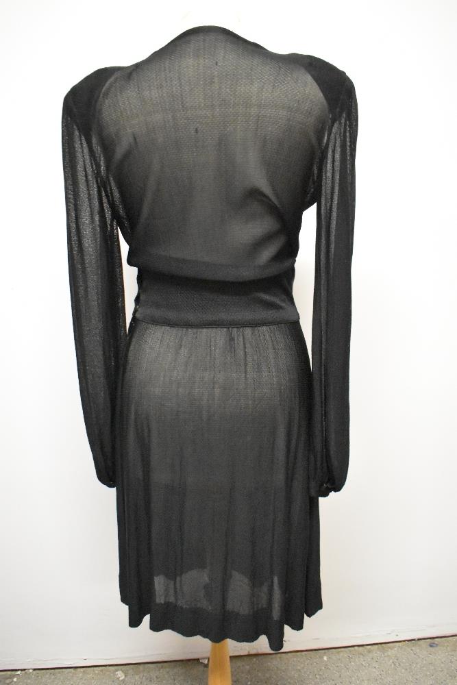 A late 1930s/early 40s semi sheer black day dress, having peplum detail to pointed dropped - Image 6 of 8