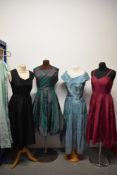 Five 1940s to 1950s taffeta dresses, including pale blue gown with shawl collar (size 46 label)