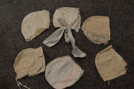 Seven Victorian and Edwardian children's and babies bonnets, including finely embroidered example.