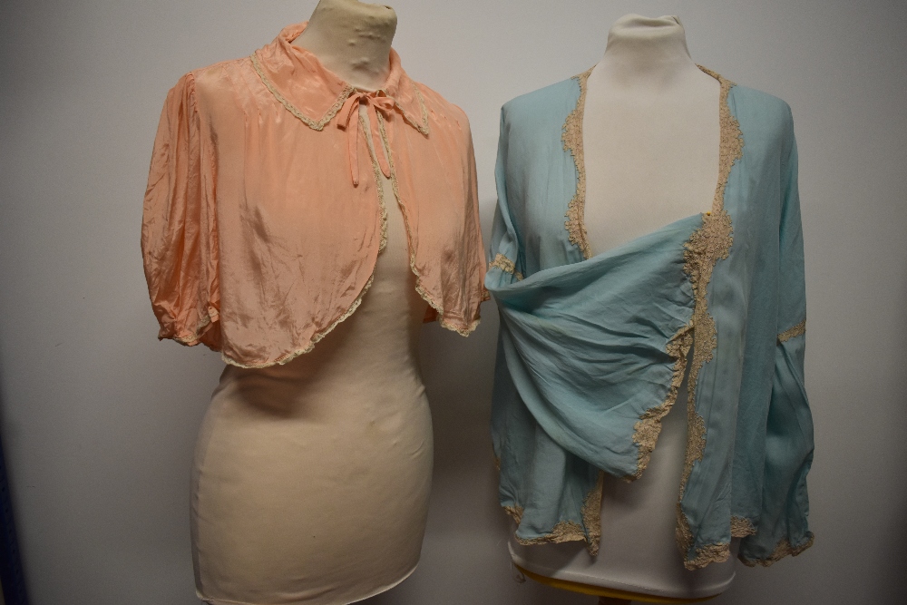 Two 1930s silk be jackets, one in pink with lace to collar and sleeves and the other blue, with deep