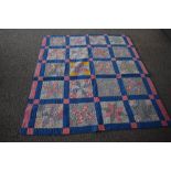 A circa 1920/ 1930s quilt, using block pattern in colourful fabrics, possibly American, very good
