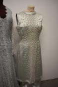Two vintage dresses; a duck egg blue 1970s Frank Usher lace gown with full length sleeves and a