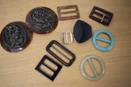 A selection of vintage buckles, including faux tortoiseshell with white metal detailing.