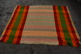 A late 1920s/1930s brightly coloured 'Goose eye' blanket, woven at the Cumbria tweed mill, (Formally