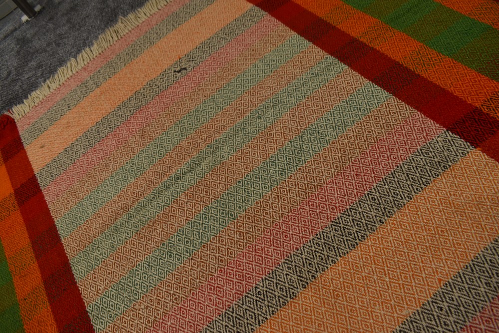 A late 1920s/1930s brightly coloured 'Goose eye' blanket, woven at the Cumbria tweed mill, (Formally - Image 3 of 7