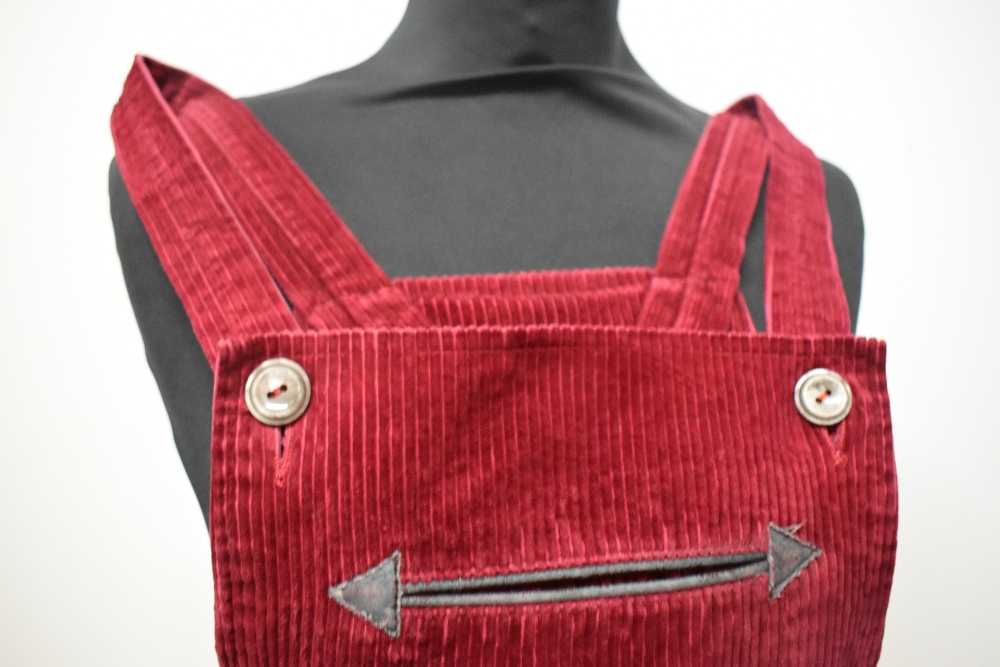 A pair of Circa mid century vibrant cherry red corduroy dungarees, having side button fastening, - Image 4 of 7